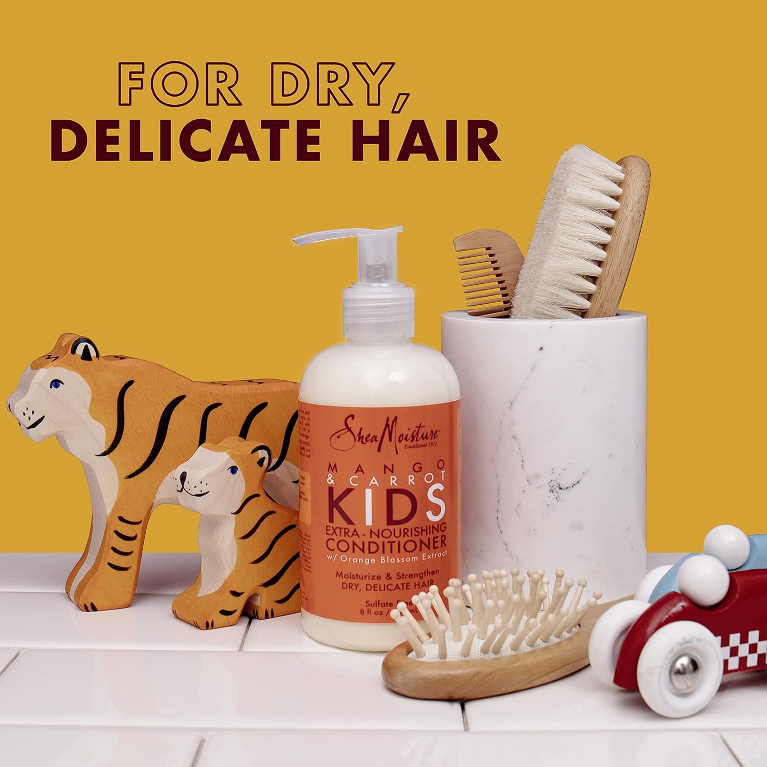 shea moisture kids hair care combination pack includes mango & carrot 8oz kids extra nourishing shampoo, 8oz kids extra nourishing conditioner, and 8oz coconut & hibiscus kids detangler