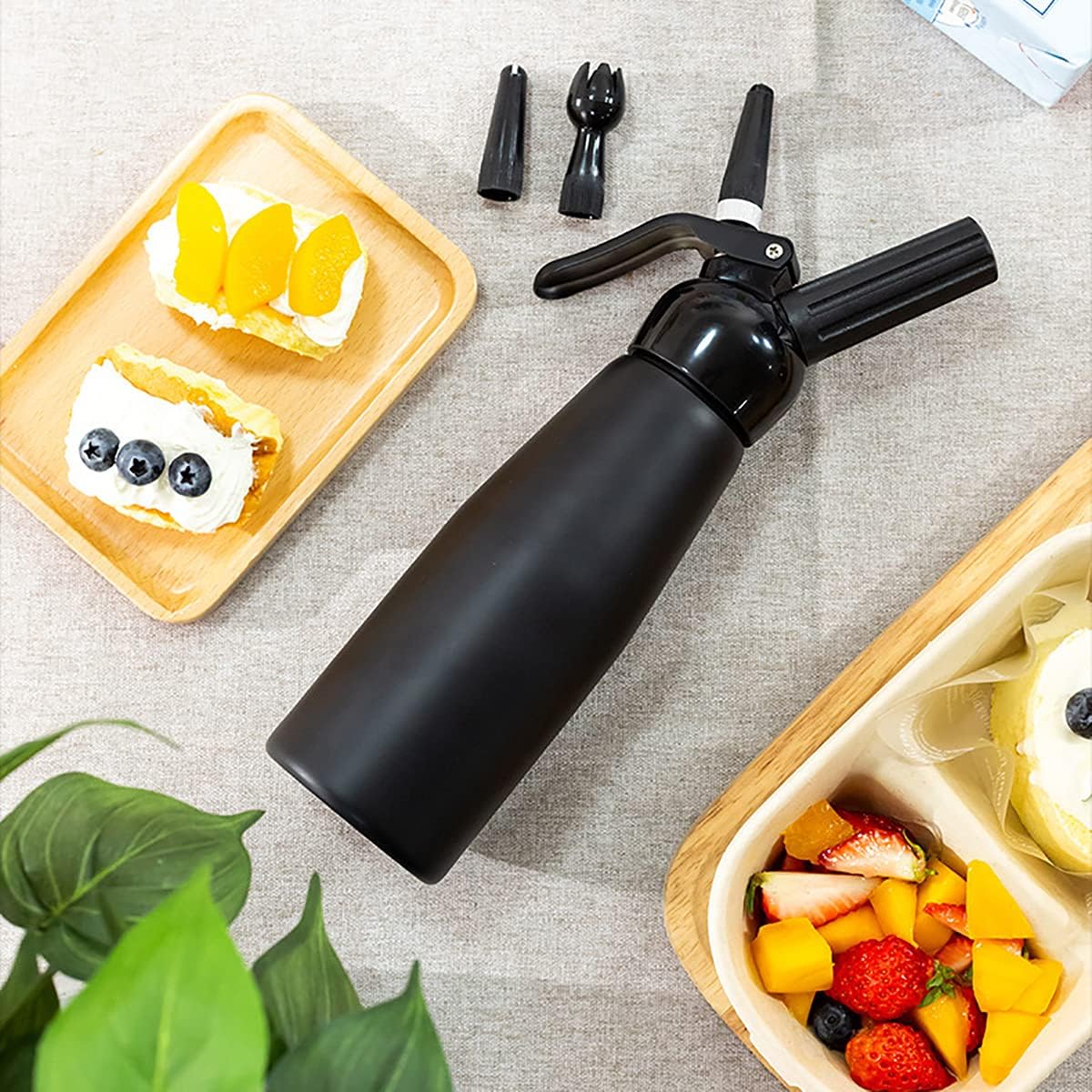 whipped cream dispenser professional aluminum culinary canister cream whipper, durable stainless steel leak free seals with 3 decorating nozzles cream foam maker for cake dessert coffee (500ml, black)