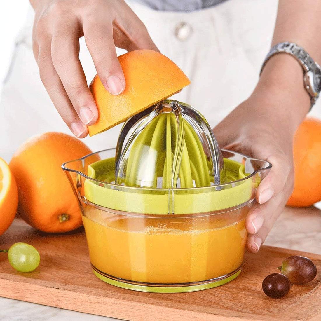 drizom citrus lemon orange juicer manual hand squeezer with built in measuring cup and grater, 12oz, green