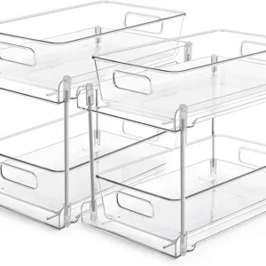 Set of two clear 2-tier under sink organizers with pull-out drawers and sliding track system.