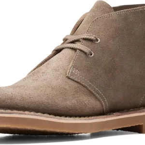 Clarks Bushacre 3 men's chukka boots in brown leather with lace-up closure, rubber sole, and classic desert boot design, displayed showing the refined casual styling
