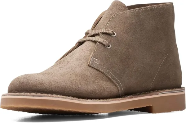 Clarks Bushacre 3 men's chukka boots in brown leather with lace-up closure, rubber sole, and classic desert boot design, displayed showing the refined casual styling