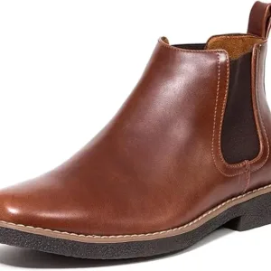 Deer Stags Rockland men's Chelsea boots in black synthetic leather with elastic side panels, pull tabs, and memory foam comfort insole, displayed at angle showing the classic Chelsea boot silhouette