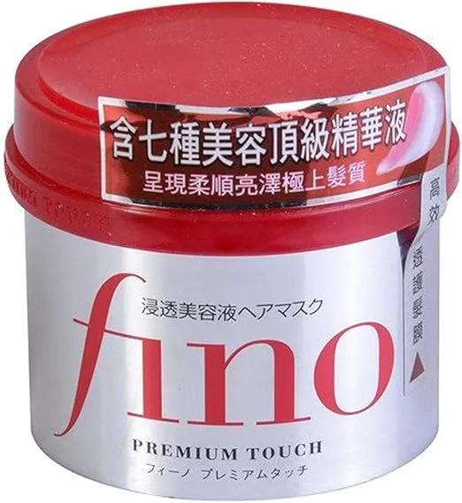 Shiseido Fino hair mask 240g jar with gold packaging, featuring intensive nourishing treatment formula for damaged and dry hair restoration.