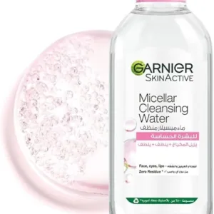 Garnier SkinActive Micellar Water 400ml bottle with pink cap, featuring gentle makeup removing formula suitable for sensitive skin and daily cleansing.
