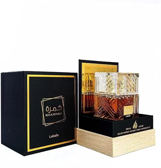 Lattafa Khamrah perfume 100ml bottle with elegant gold and black packaging, featuring luxury unisex eau de parfum with oriental fragrance notes.