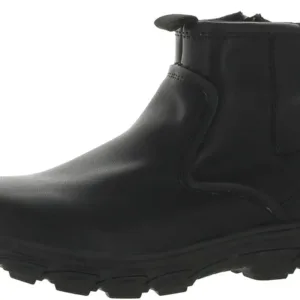 Skechers Resment Korver men's chukka boots in brown leather with lace-up closure, memory foam comfort technology, and flexible sole, displayed at angle showing the classic ankle boot design