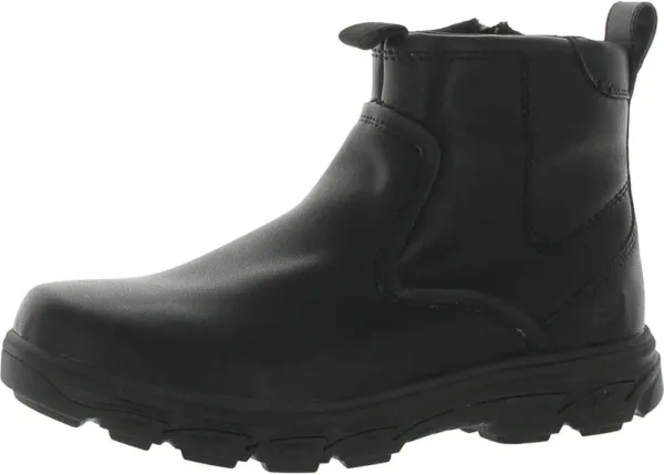 Skechers Resment Korver men's chukka boots in brown leather with lace-up closure, memory foam comfort technology, and flexible sole, displayed at angle showing the classic ankle boot design