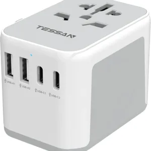 Black universal travel adapter with 2 USB-C and 2 USB-A ports. Compatible with UK, EU, USA, and AU plugs for convenient global charging.