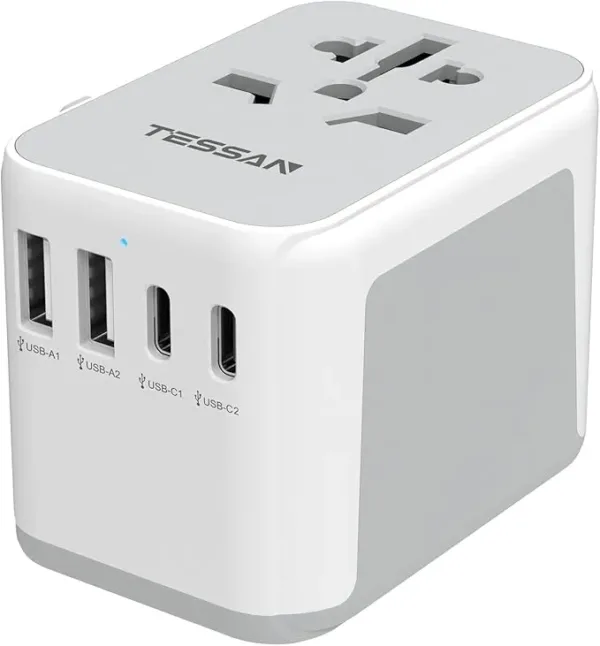 Black universal travel adapter with 2 USB-C and 2 USB-A ports. Compatible with UK, EU, USA, and AU plugs for convenient global charging.