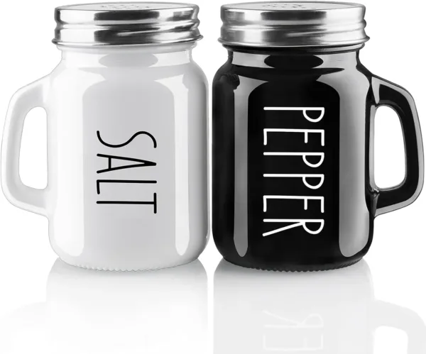 4oz glass salt and pepper shaker set with black and white design and stainless steel lids.