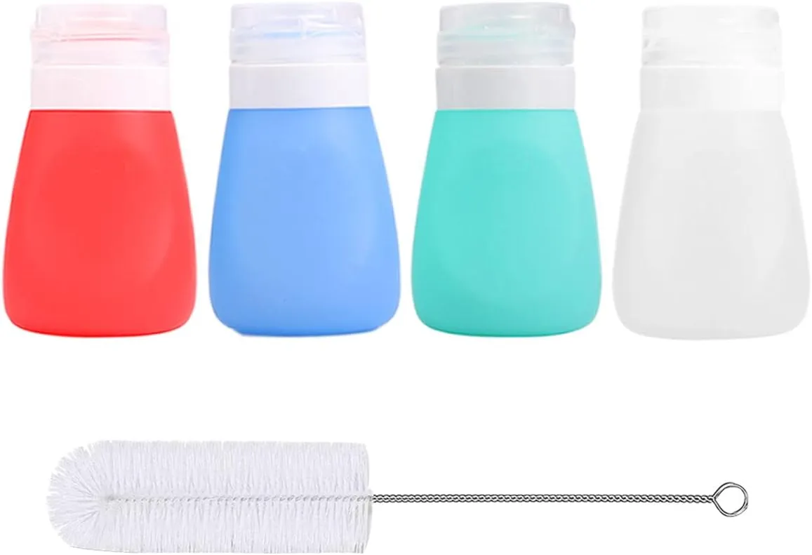 Set of four 13oz silicone squeeze dressing bottles with caps and a cleaning brush, BPA-free and portable.