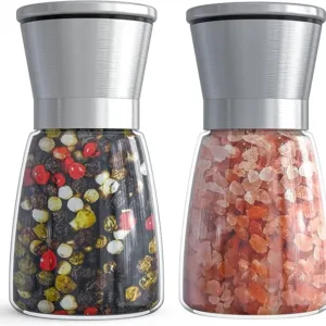 Set of two stainless steel and glass salt and pepper grinders with adjustable coarseness and refillable 6 oz capacity.
