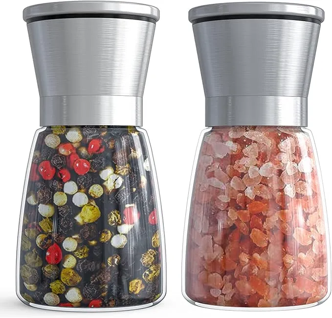 Set of two stainless steel and glass salt and pepper grinders with adjustable coarseness and refillable 6 oz capacity.