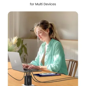 UGREEN Nexode 65W USB C charger with 3 ports, using GaN technology, quickly charging a laptop and phone simultaneously.