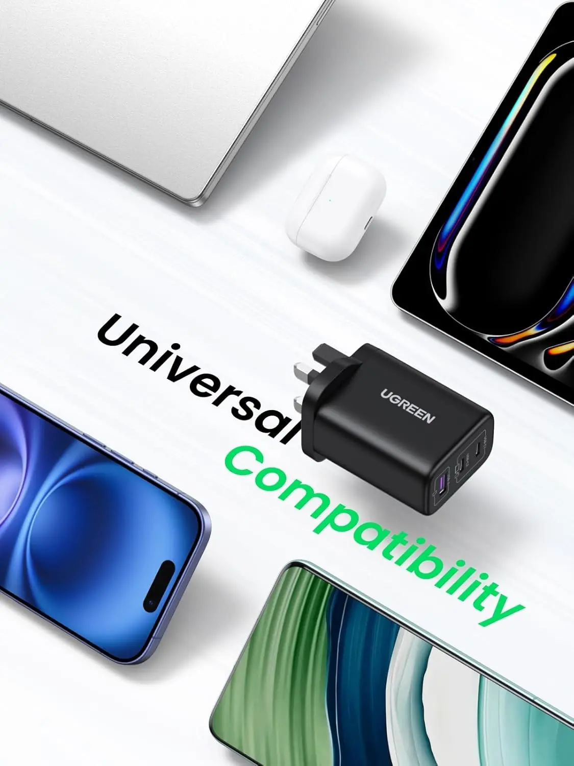 UGREEN Nexode 65W USB C charger with 3 ports, using GaN technology, quickly charging a laptop and phone simultaneously.