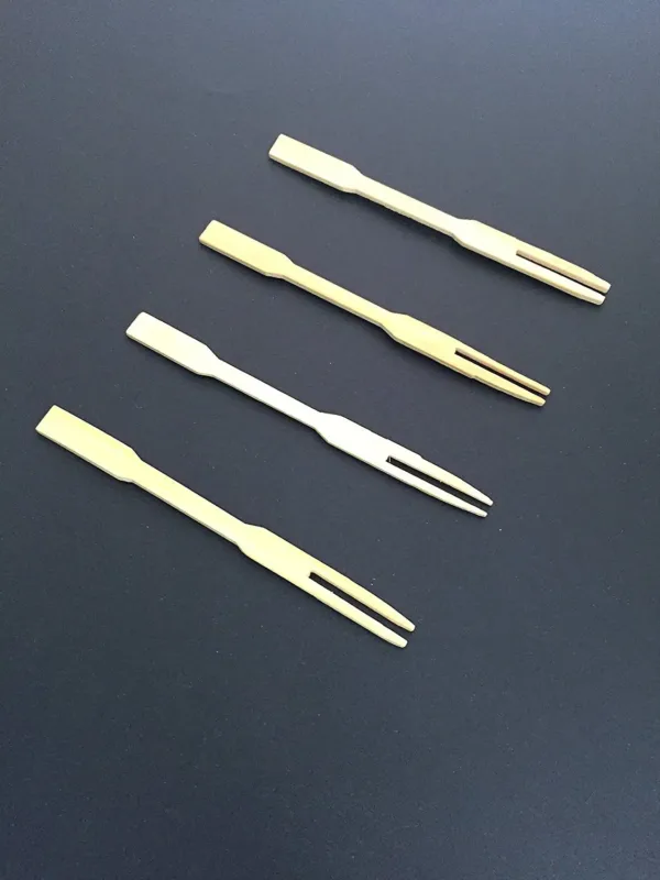 This is a set of 100 eco-friendly, 3.5 inch bamboo mini forks, perfect for serving appetizers, cocktails, and hors d'oeuvres at parties and catering events.