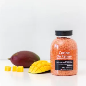 Corine de Farme Mango bath salts offer a relaxing bath experience, dissolving quickly to soften skin and promote well-being with their delicate mango scent and antiseptic properties.