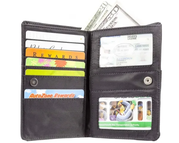 This is a Big Skinny plus size women's bi-fold wallet with a zippered coin compartment, extra wide card pockets, large billfold pockets, a wrist strap, and a magnetic clasp closure, capable of holding up to 20 cards.
