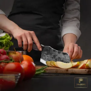 This is a handcrafted 6-inch high carbon steel boning knife with a leather sheath, featuring a curved wooden handle, ideal for butchering, camping, and various kitchen tasks.