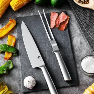 This stainless steel carving knife and fork set features a razor-sharp blade and hollow handles for lightweight use, perfect for carving turkey, ham, or roasts with ease and precision.