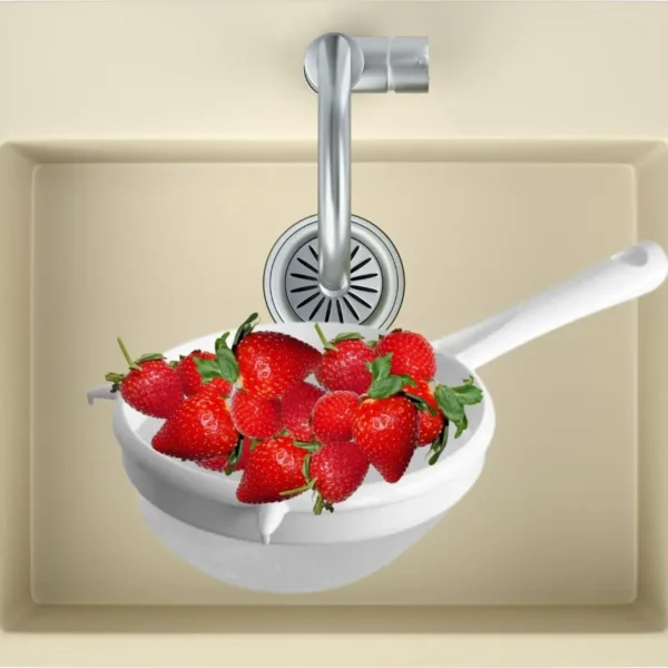 A Fackelmann Arcad 17cm white and silver sieve is shown, highlighting its simple and comfortable design for everyday kitchen use.