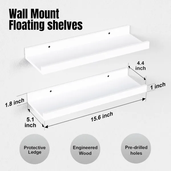 This set of two white floating shelves with a front lip provides sturdy and stylish wall-mounted storage for displaying pictures, books, plants, and decorative items in any room.