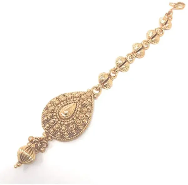This gold-plated Indian maang tikka features a teardrop pendant with a delicate bead drop, handcrafted in India and perfect for weddings or special occasions.