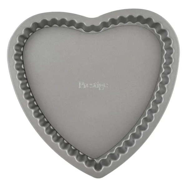 This is a grey, non-stick heart-shaped baking pan made from carbon steel with a loose base, perfect for baking cakes for special occasions.
