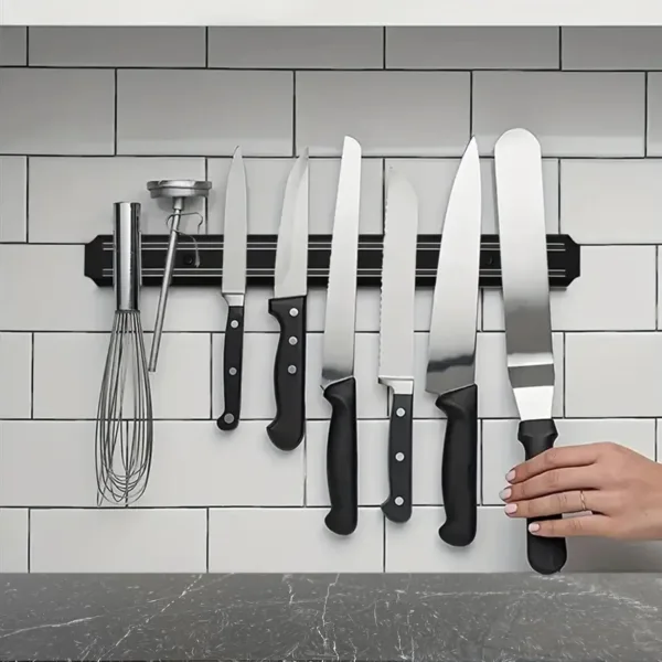 This magnetic knife holder keeps your knives and kitchen tools organized and easily accessible, saving valuable drawer space.