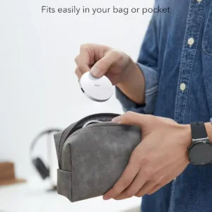 This white ESR MagSafe-compatible wireless charger features a built-in kickstand and a removable 5 ft USB-C cable for conveniently charging iPhone 12 to 17 and AirPods 4.