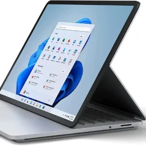 A silver Microsoft Surface Laptop Studio with an Intel i5 processor, 16GB of RAM, and 256GB of storage is displayed.