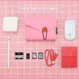 This pink NIDOO felt case is designed for carrying and protecting your MacBook power adapter, mouse, mobile phone, cables, SSD, HDD, power bank, and other small electronic accessories.