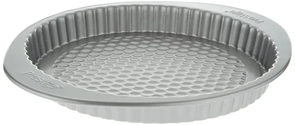 This 9 inch non stick flan tin with a honeycomb base ensures even baking and easy release, thanks to its premium non-stick coating, and it's freezer-to-oven safe for added convenience.