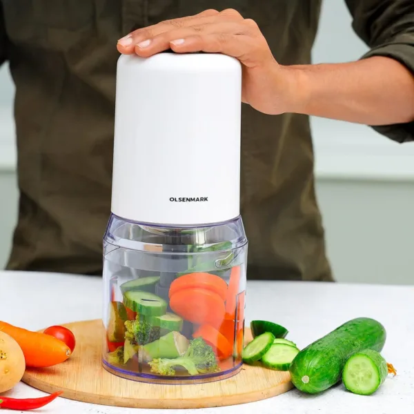 This is a compact Olsenmark 500ml food chopper with a powerful 500W motor and durable stainless steel blades, ideal for chopping vegetables, fruits, herbs, and mincing meat quickly and efficiently in any kitchen.