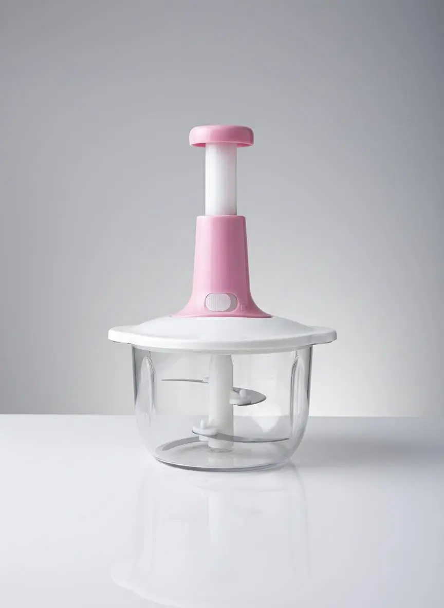 This is a one-touch food chopper with stainless steel blades and a transparent bowl, ideal for quickly chopping vegetables, mincing meat, and blending sauces.