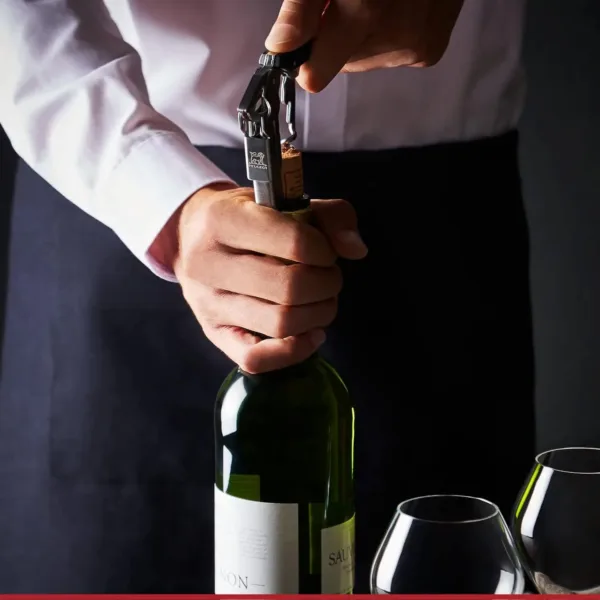 This Peugeot Clavelin Sommelier Corkscrew is a compact, manual wine opener made in France, featuring a patented handle for easy cork removal and a built-in foil cutter for added convenience.