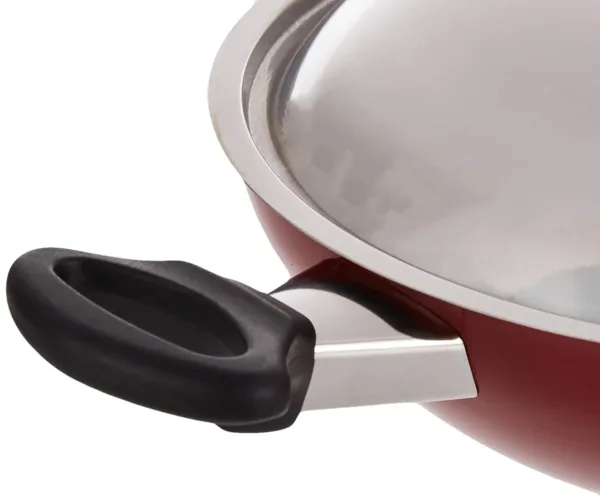This red Prestige flat bottom kadai features a non-stick coating for healthy, low-fat cooking and comes with a metal lid to preserve nutrients and flavor.