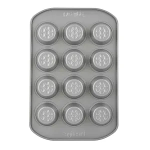 Bake delicious mini muffins with ease using the Prestige 12-cup muffin tin, featuring a nonstick surface, durable carbon steel construction, and a honeycomb base for even browning and easy release.