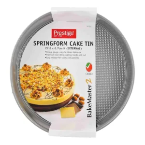 This Prestige springform cake tin features a heavy-gauge carbon steel construction, a non-stick coating for easy food release, and a cushion smart surface for even browning.