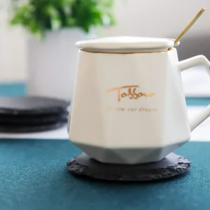 This set of four black slate coasters features a natural, rough-edged design, providing a rustic and stylish surface to protect furniture from drink spills and water rings in your kitchen, living room, or bar area.