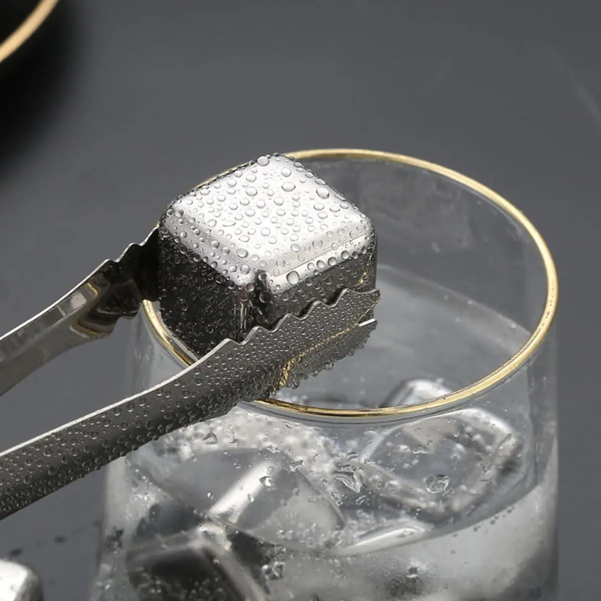 These reusable stainless steel ice cubes with a storage box and tongs provide a safe, fast, and easy way to chill drinks without diluting them.