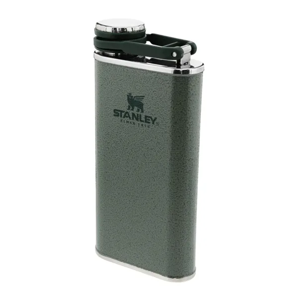 The green Stanley Classic Wide Mouth Hip Flask is made from stainless steel, features a wide mouth for easy pouring, and is leakproof for on-the-go use.