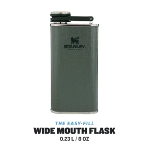 The green Stanley Classic Wide Mouth Hip Flask is made from stainless steel, features a wide mouth for easy pouring, and is leakproof for on-the-go use.