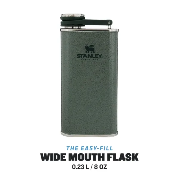 The green Stanley Classic Wide Mouth Hip Flask is made from stainless steel, features a wide mouth for easy pouring, and is leakproof for on-the-go use.