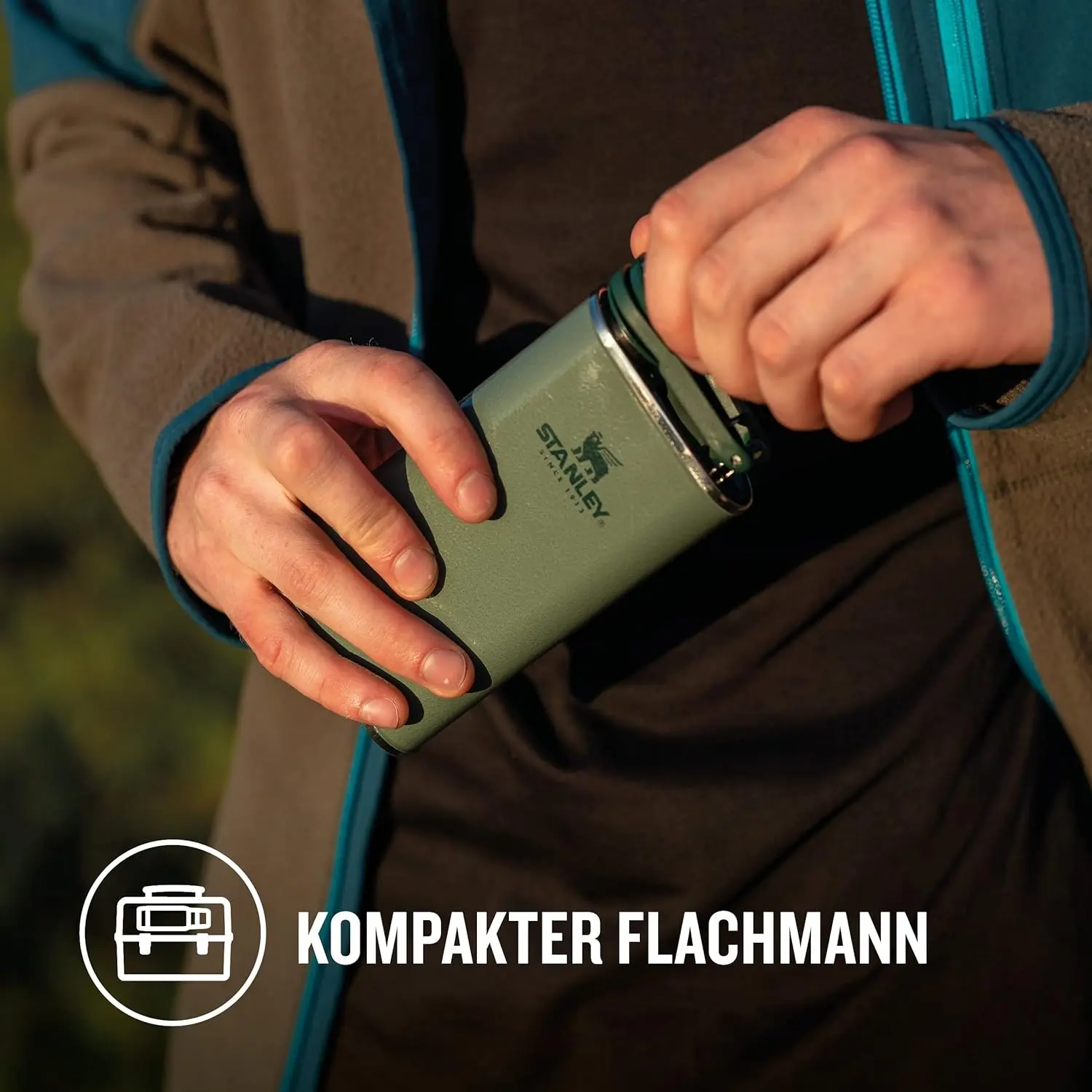 The green Stanley Classic Wide Mouth Hip Flask is made from stainless steel, features a wide mouth for easy pouring, and is leakproof for on-the-go use.