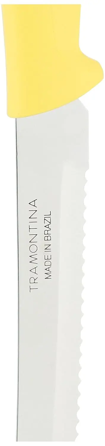 This vibrant yellow Tramontina Plenus knife features a sharp stainless steel blade perfect for slicing steaks and fruits, offering both elegance and functionality for everyday dining.
