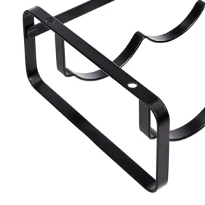 A stackable steel wine rack with a wave design securely holds wine bottles on a tabletop, preventing them from rolling.