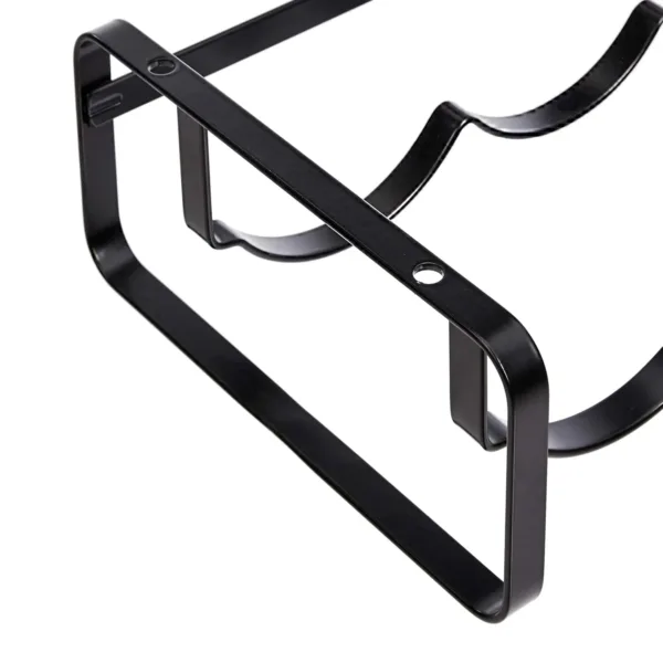 A stackable steel wine rack with a wave design securely holds wine bottles on a tabletop, preventing them from rolling.