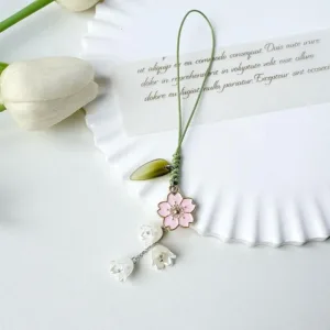This set of three tulip phone charms features delicate glazed flower designs in different styles, adding a unique and lovely touch to your cell phone, keys, backpack, or other accessories while also preventing loss.